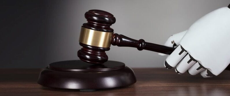 Robot and male human hand doing a fist bump. The man's writs has a white cuff visible.