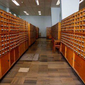 Bricklayer laying bricks on mortar on new residential house construction.