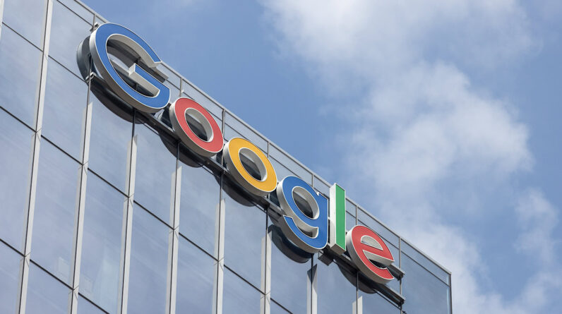 Looking up at an angle at the Google sign on the Head Office for Canada